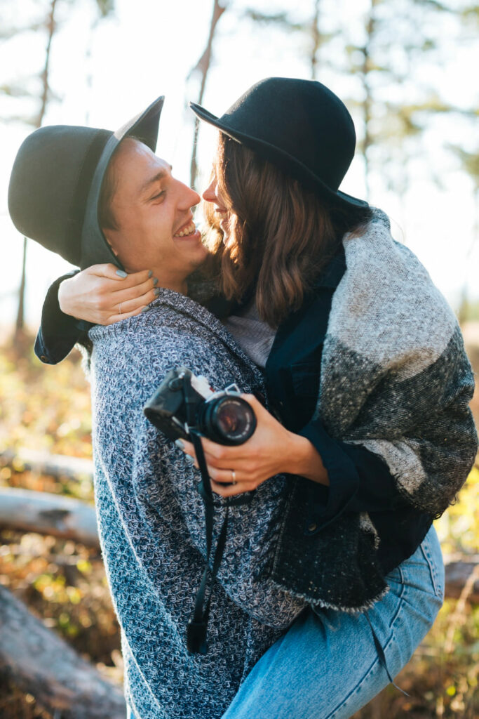 Couple taking playful selfies and creative photogrid shots