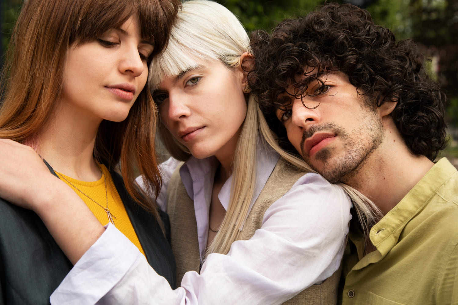 ENM meaning explained, what is ethical non-monogamy? Diverse group of people sharing a connection outdoors
